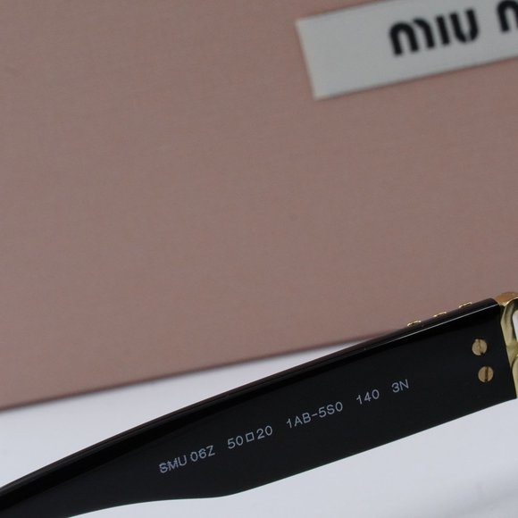 Miu Miu MU06ZS 1AB5S0 Oval Sunglasses - Black / Grey main image 4
